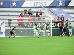 Connor Tobin nods home the first goal of the match.